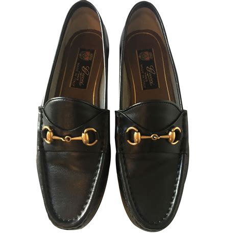 En cuir mocassins Gucci Noir taille 39 EU en Cuir .